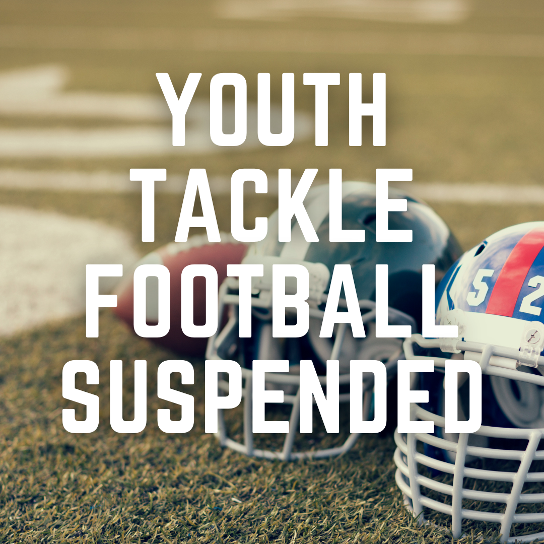 image of two football helmets on a football field with text reading 