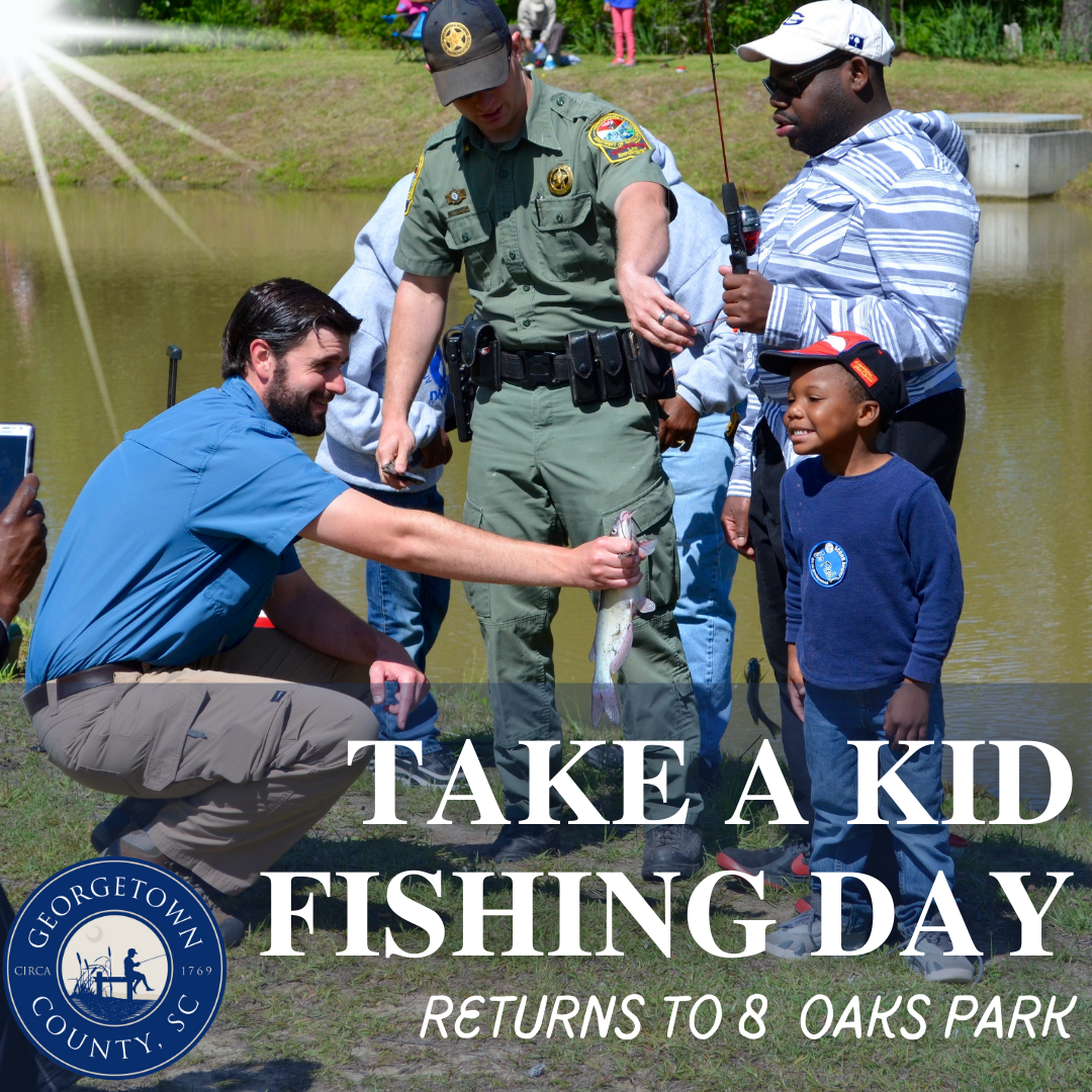 County logo on photo of staff members helping an adult and child fish at 8 Oaks Pond.