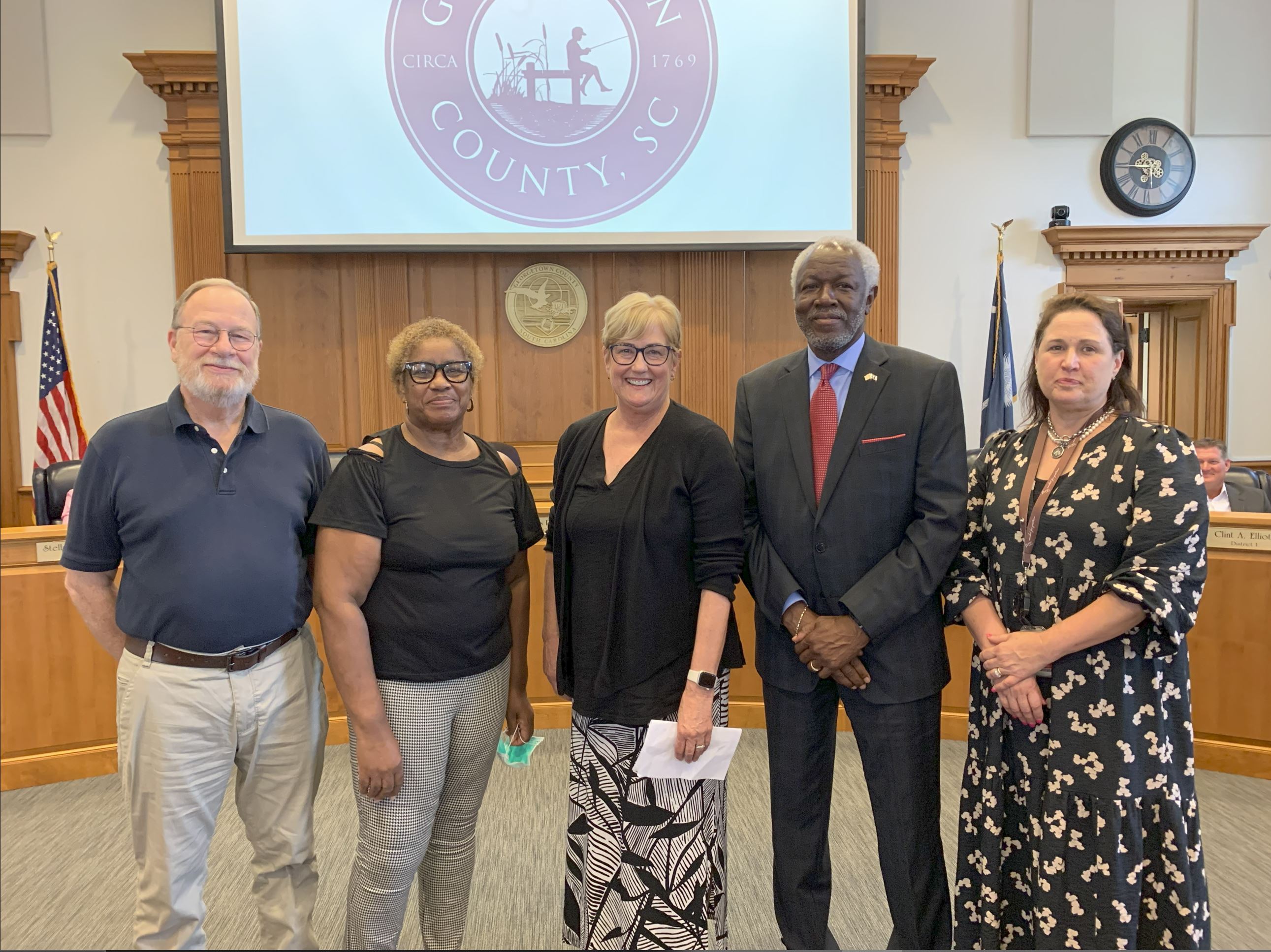 A group photo with representatives of GCBDSN and Georgetown county standing in a line smiling