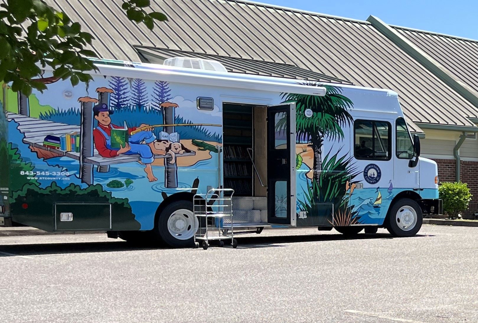 The new bookmobile parked near the Andrews Library branch