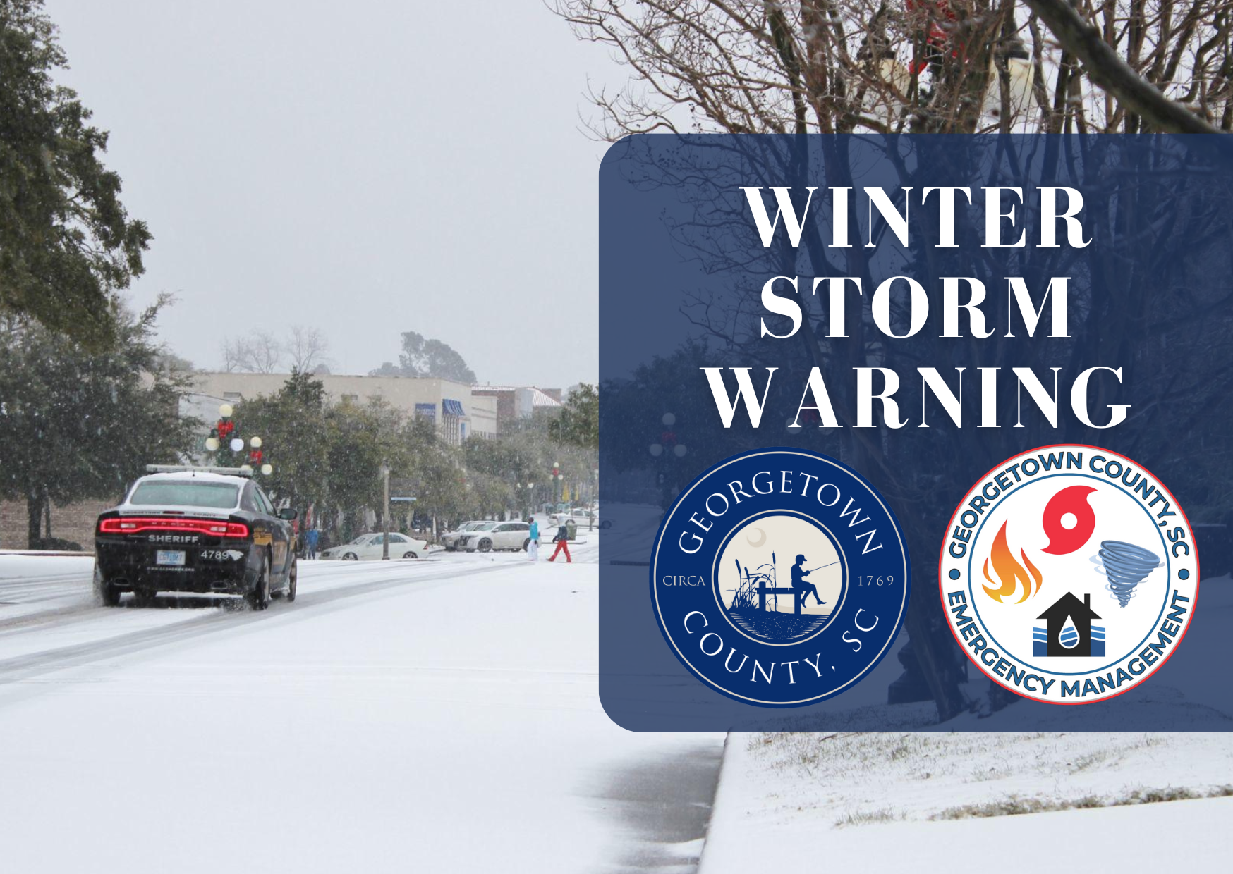 Sheriff's Office patrol car driving down a snowy Front Street with text reading winter storm warn